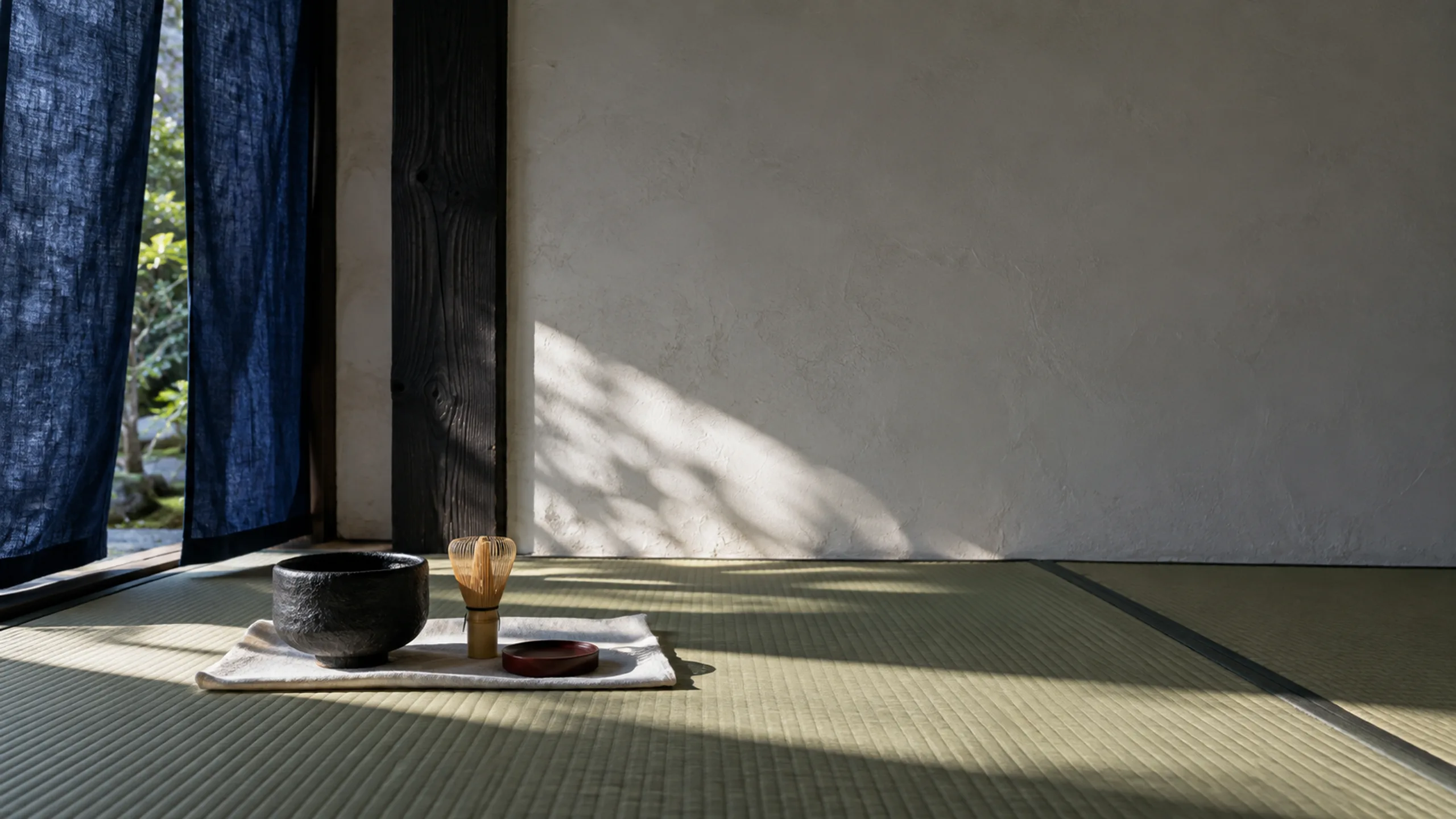 Kumo branded cover artwork: An indigo noren and afternoon tea in a Kyoto ryokan