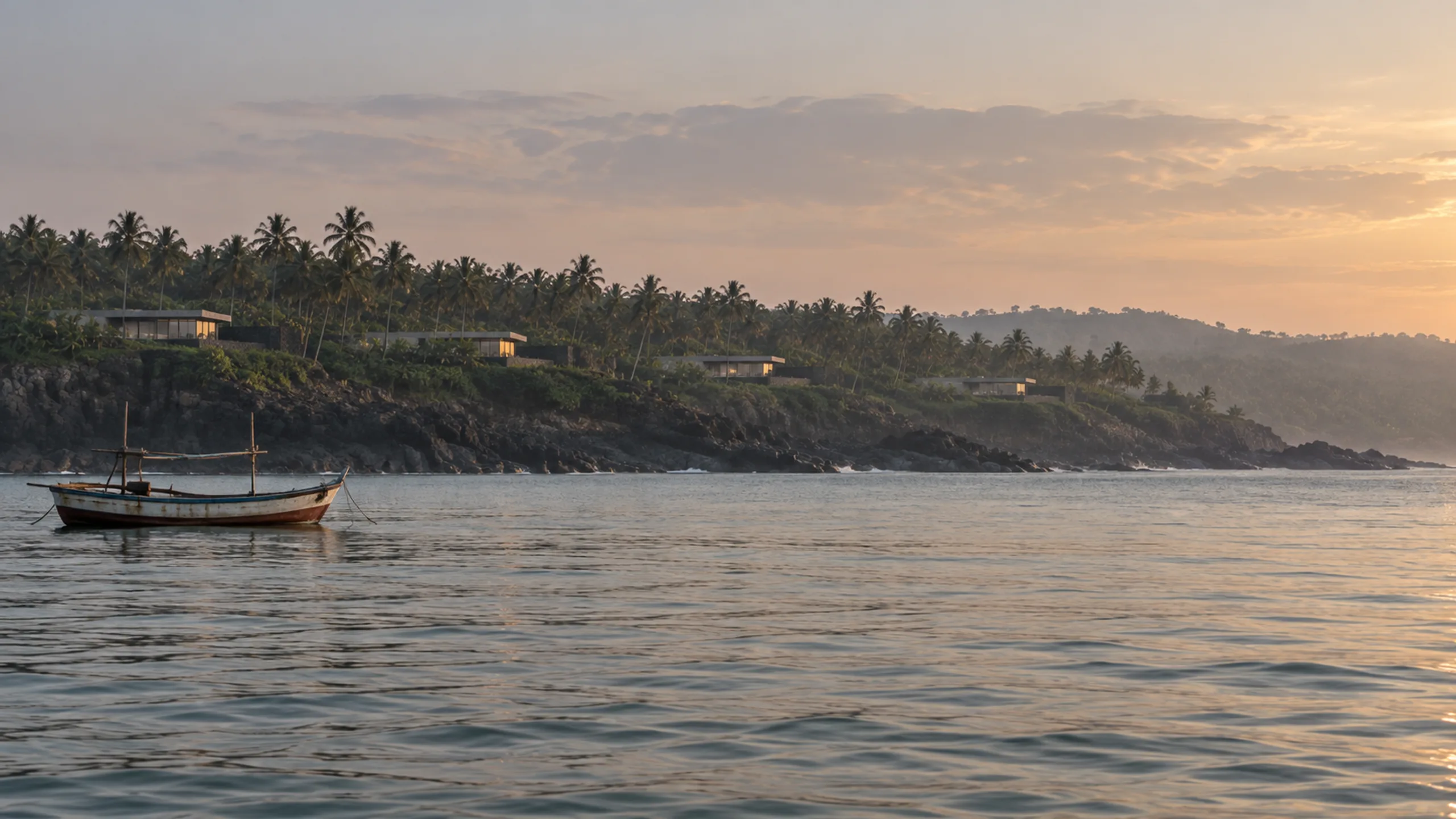 Vantage branded context artwork: A concrete and basalt house on the Konkan coast at blue hour